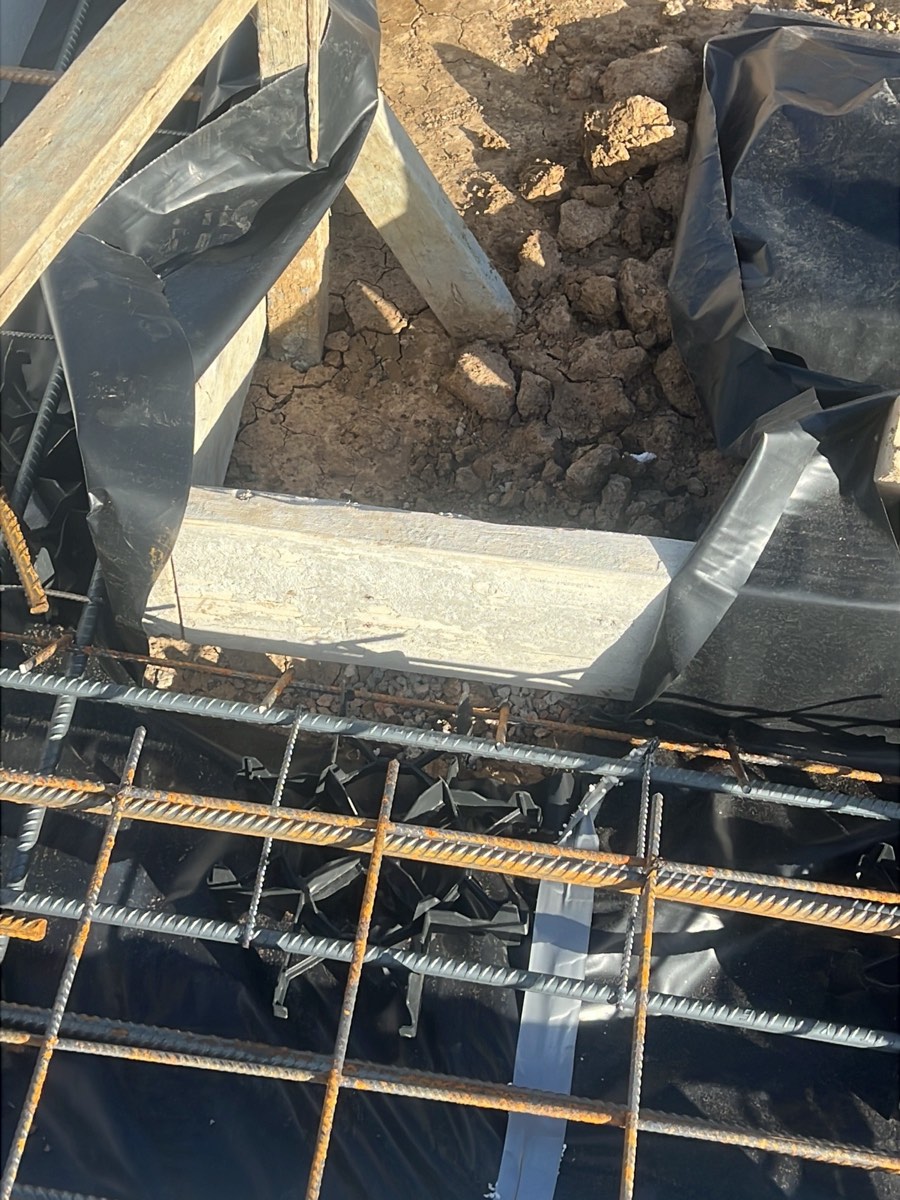 Barrier not extended beneath the entire slab, recorded on a slab pre-pour inspection in Marsden Park